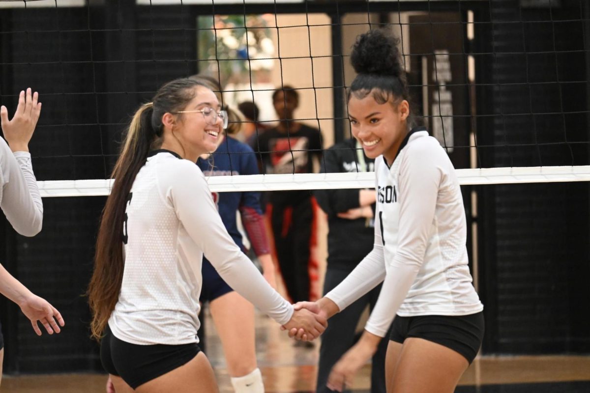 Volleyball team staying positive despite schedule packed with tough competition
